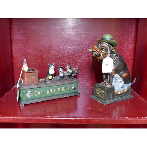 42 - Two reproduction cast metal money boxes, cat and mouse and Ole Puffer