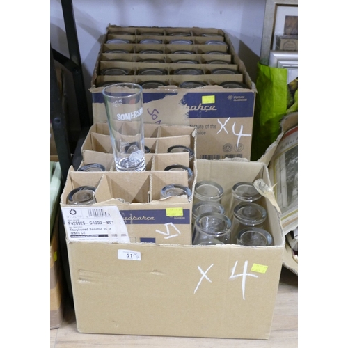 51 - Four boxes of as new brewery glasses, Tiny Rebel pint glasses, Somersby pint glasses etc