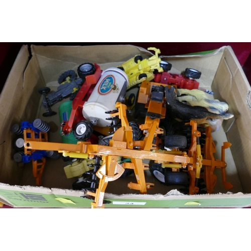 34 - Box of farm vehicles and plastic dogs