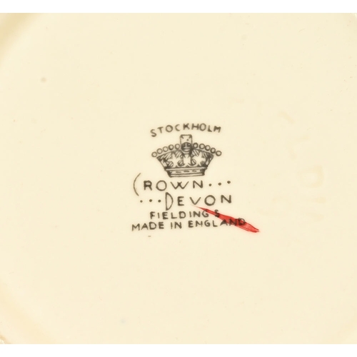 68 - A Crown Devon Stockholm pattern tea and dinnerware, ashette, dinner plates, tureen, toast rack, cups... 