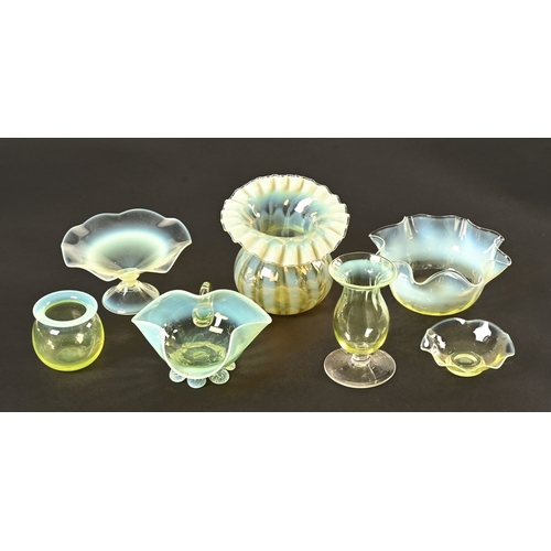 79 - A collection of seven pieces of Victorian Vaseline glass. Tallest 11.5 cm.