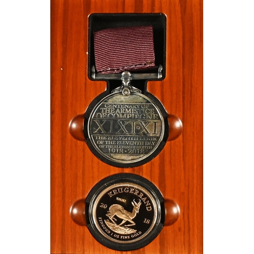 187 - A 2018 Krugerrand Launch set, 1 ounce proof Krugerrand in 22 ct gold, weight 33.9 grams and a commem... 