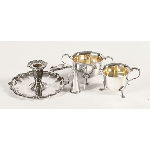 432 - A 19th century silver plated chamber candlestick, with snuffer, together with a silver plated cream ... 