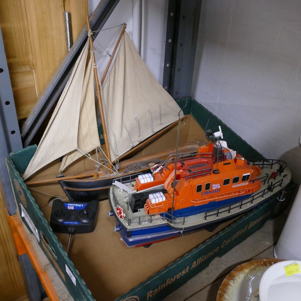 Remote control lifeboat and wooden pond yacht