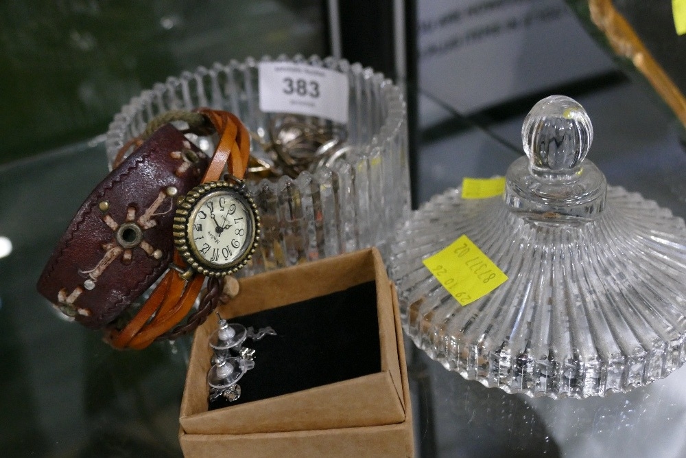 Pressed lidded glass vase with rings, leather bangles, watch, earrings etc