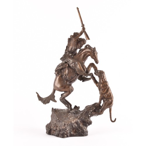 307 - After Charles Marion Russell (American, 1864-1926)A bronze of a cowboy fighting off a mountain lion,... 