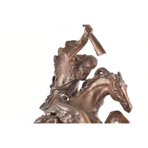 307 - After Charles Marion Russell (American, 1864-1926)A bronze of a cowboy fighting off a mountain lion,... 