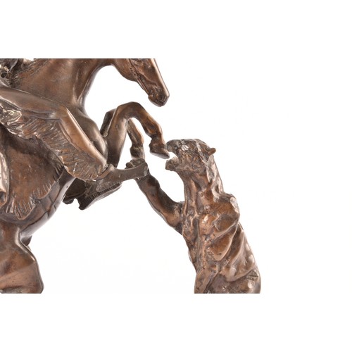 307 - After Charles Marion Russell (American, 1864-1926)A bronze of a cowboy fighting off a mountain lion,... 