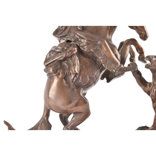 307 - After Charles Marion Russell (American, 1864-1926)A bronze of a cowboy fighting off a mountain lion,... 