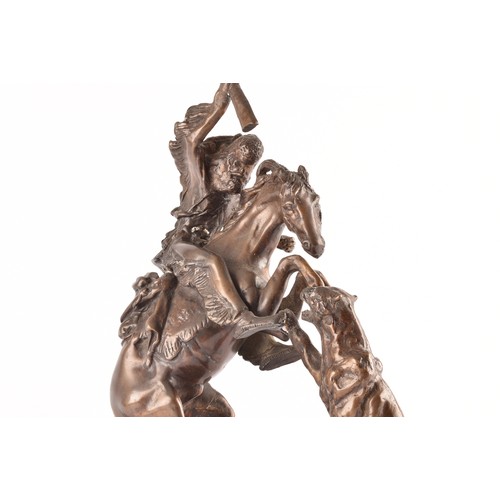 307 - After Charles Marion Russell (American, 1864-1926)A bronze of a cowboy fighting off a mountain lion,... 