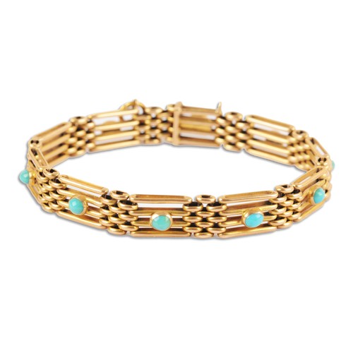 3 - An 18ct yellow gold bar link bracelet, the articulated segments inset with cabochon turquoise stones... 