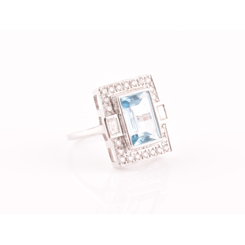 7 - An 18ct white gold, diamond, and aquamarine cocktail ring, set with a mixed rectangular-cut aquamari... 