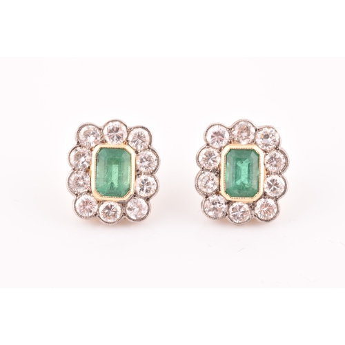 8 - A pair of 18ct yellow gold, diamond, and emerald earrings, each set with a mixed emerald-cut emerald... 