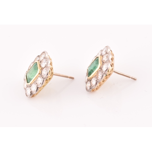 8 - A pair of 18ct yellow gold, diamond, and emerald earrings, each set with a mixed emerald-cut emerald... 