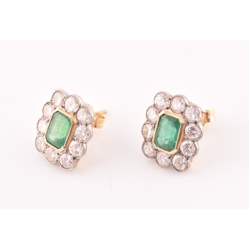 8 - A pair of 18ct yellow gold, diamond, and emerald earrings, each set with a mixed emerald-cut emerald... 