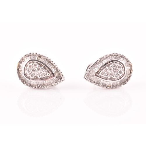 12 - A pair of 18ct white gold and diamond pear-shaped cluster earrings, the diamonds of approximately 1.... 