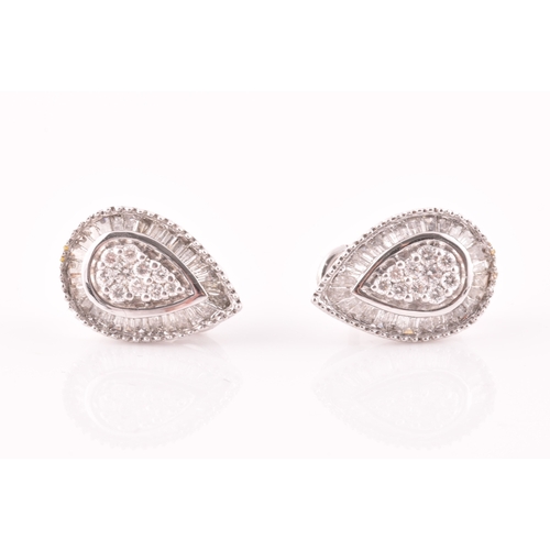 12 - A pair of 18ct white gold and diamond pear-shaped cluster earrings, the diamonds of approximately 1.... 