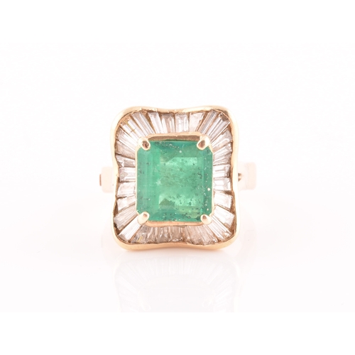 13 - An 18ct yellow gold, diamond, and emerald 'ballerina' cocktail ring, the waved mount inset with tape... 