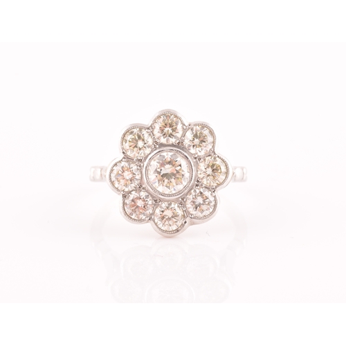 15 - A platinum and diamond floral cluster ring, set with nine round brilliant-cut diamonds, of approxima... 