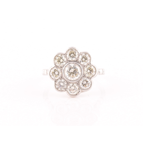 15 - A platinum and diamond floral cluster ring, set with nine round brilliant-cut diamonds, of approxima... 