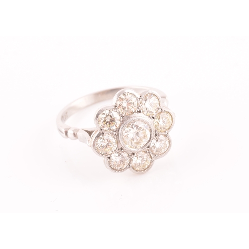 15 - A platinum and diamond floral cluster ring, set with nine round brilliant-cut diamonds, of approxima... 