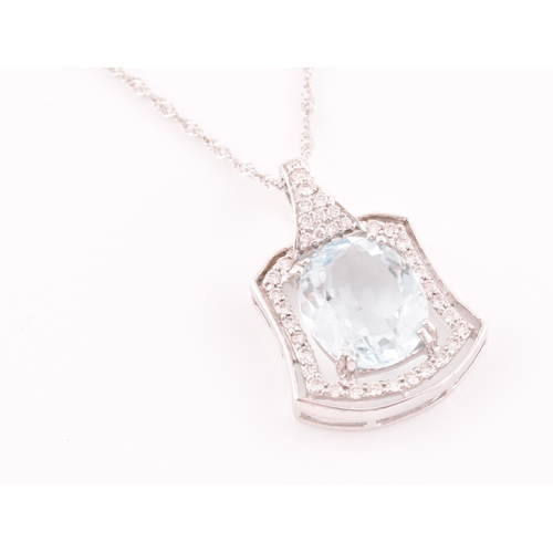 16 - An 18ct white gold, diamond, and aquamarine, pendant, set with a mixed oval-cut aquamarine measuring... 