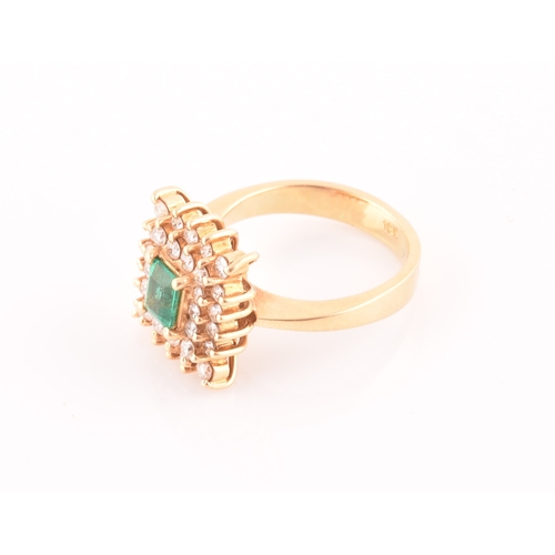 25 - An 18ct yellow gold, diamond, and emerald ring, set with a mixed emerald-cut emerald, within a doubl... 