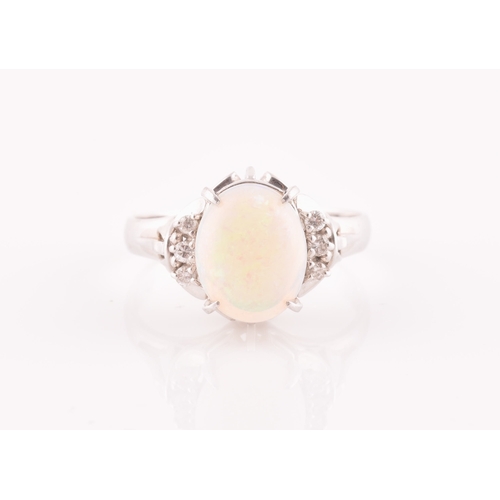 26 - A platinum, diamond, and opal ring, four-claw set with an oval cabochon opal, with three round-cut d... 