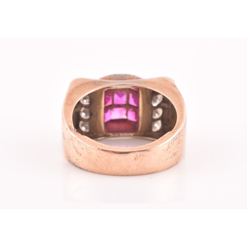 30 - A 1940s ruby and diamond cocktail ring, the raised mount inset with nine mixed square-cut rubies, wi... 