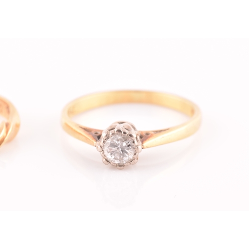 31 - An 18ct yellow gold solitaire diamond ring, set with a round brilliant-cut diamond of approximately ... 