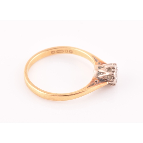 31 - An 18ct yellow gold solitaire diamond ring, set with a round brilliant-cut diamond of approximately ... 