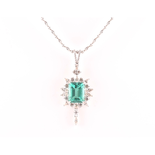 36 - An impressive diamond and emerald drop pendant necklace, set with a (synthetic) hydrothermal emerald... 