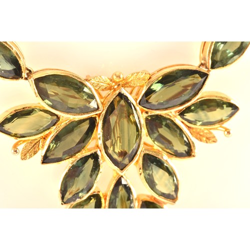 37 - A high carat yellow gold and green sapphire necklace, comprised of bezel-set mixed marquise-cut gree... 