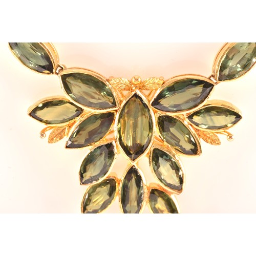 37 - A high carat yellow gold and green sapphire necklace, comprised of bezel-set mixed marquise-cut gree... 