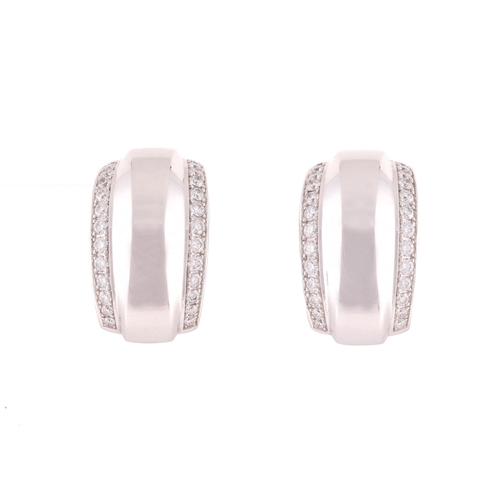 39 - Chopard. A pair of 18ct white gold and diamond earrings, in the La Strada design, the curved half ho... 