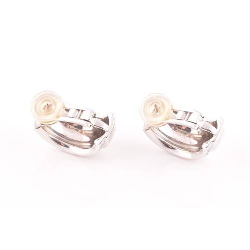 39 - Chopard. A pair of 18ct white gold and diamond earrings, in the La Strada design, the curved half ho... 