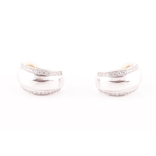 39 - Chopard. A pair of 18ct white gold and diamond earrings, in the La Strada design, the curved half ho... 