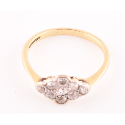 40 - An 18ct yellow gold and diamond navette ring, set with nine old-cut diamonds, ring mount measuring a... 