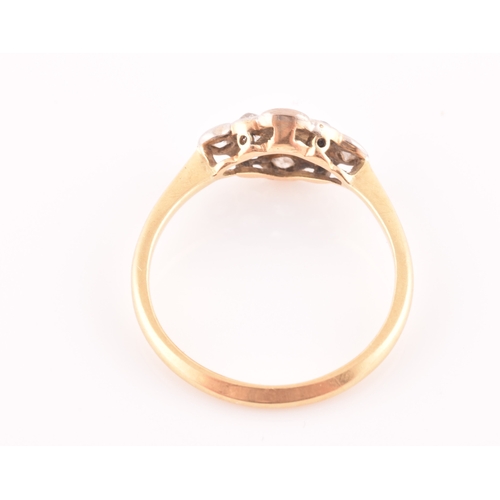 40 - An 18ct yellow gold and diamond navette ring, set with nine old-cut diamonds, ring mount measuring a... 