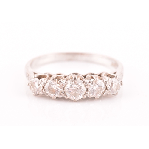 41 - An 18ct white gold and diamond ring, set with five graduated round brilliant-cut diamonds, of approx... 