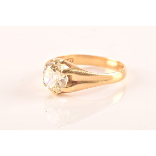 42 - An 18ct yellow gold solitaire diamond ring, set with an old cushion-cut diamond of approximately 2.7... 