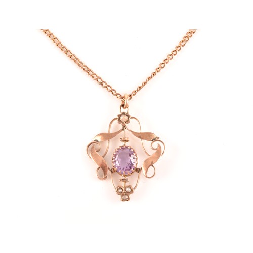 47 - An Edwardian 9ct rose gold, amethyst and split seed pearl Art Nouveau pendant, the scrolled openwork... 