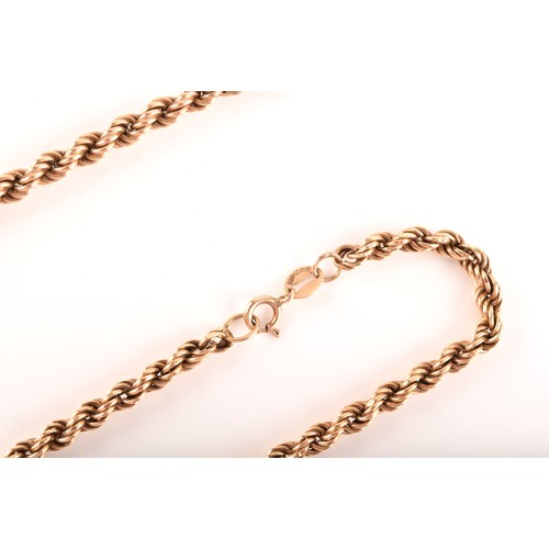 48 - A 9ct yellow gold rope-twist necklace, together with a matching 9ct gold rope-twist bracelet, and a ... 