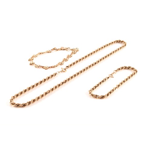 48 - A 9ct yellow gold rope-twist necklace, together with a matching 9ct gold rope-twist bracelet, and a ... 