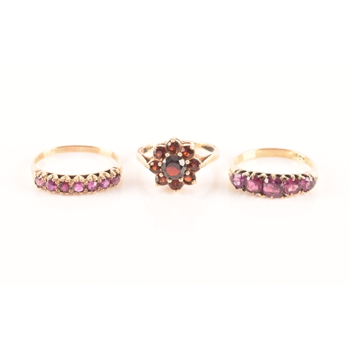 49 - An 18ct yellow gold and purple spinel five stone ring, set with mixed cushion and round-cut spinels,... 