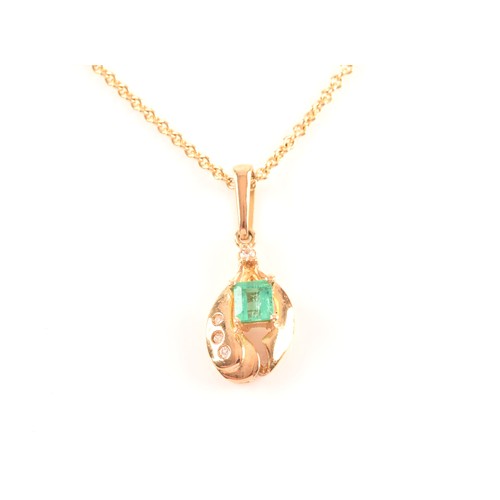 50 - A yellow gold and emerald pendant, set with a mixed rectangular-cut emerald, measuring approximately... 