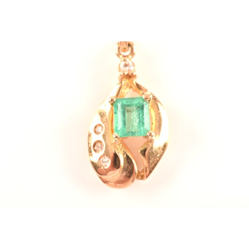 50 - A yellow gold and emerald pendant, set with a mixed rectangular-cut emerald, measuring approximately... 