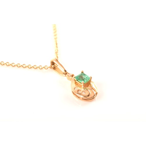 50 - A yellow gold and emerald pendant, set with a mixed rectangular-cut emerald, measuring approximately... 