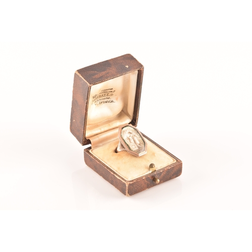 53 - An 18th century yellow gold mourning ring, the chamfered rectangular mount sent with an ivory plaque... 