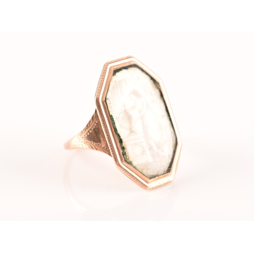 53 - An 18th century yellow gold mourning ring, the chamfered rectangular mount sent with an ivory plaque... 